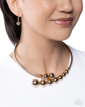 Load image into Gallery viewer, Smoldering Showcase - Gold Paparazzi Accessories