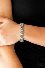Load image into Gallery viewer, Strut Your Stuff Silver Rhinestone Stretchy Bracelet Paparazzi Accessories