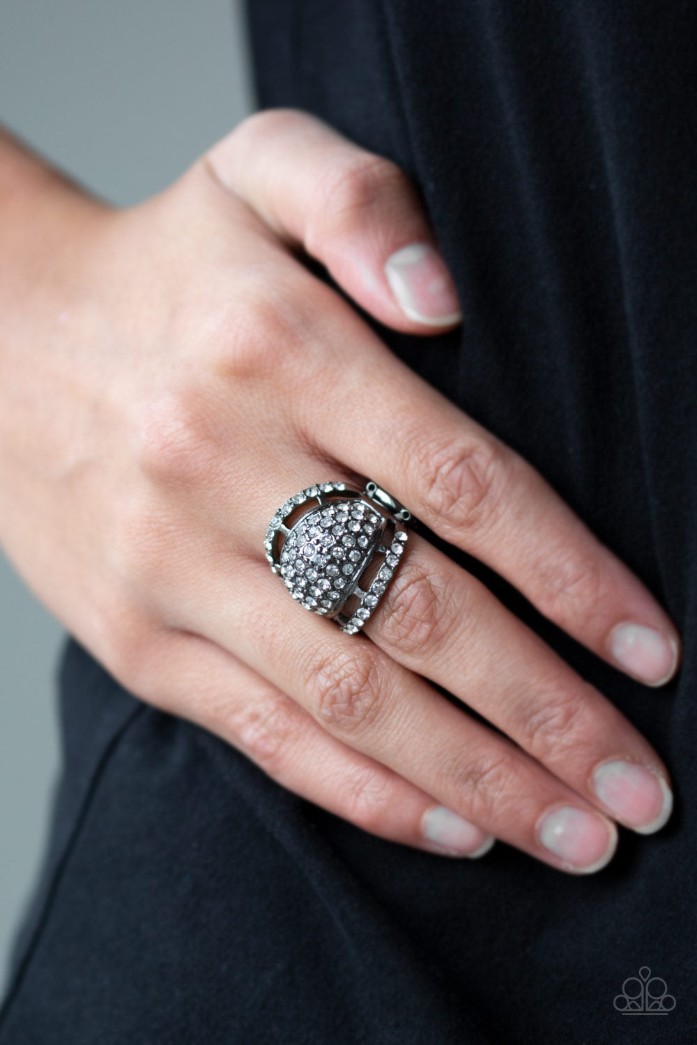 The Seven-Figure Itch Black Rhinestone Ring Paparazzi Accessories