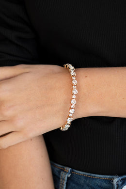 Photo Op - Gold Rhinestone Coil Bracelet Paparazzi Accessories