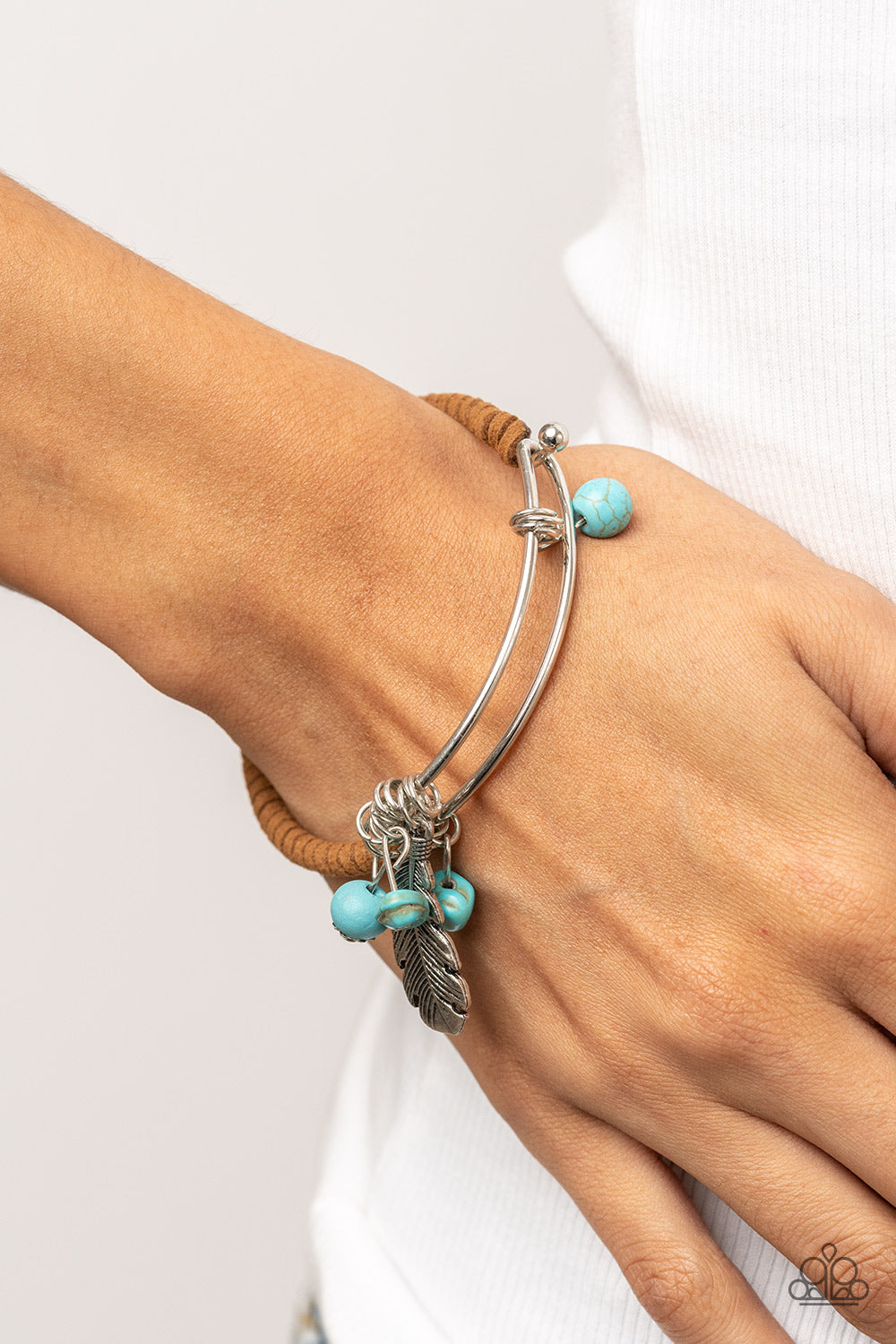Running a-FOWL - Blue Stone Feather Hinge Bracelet Paparazzi Accessories