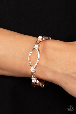 Interwoven Illusion - Rose Gold Rhinestone Hinge Bracelet Paparazzi Accessories